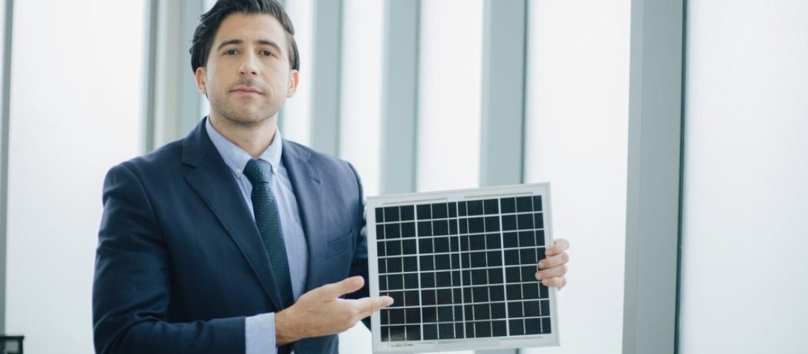 Business man present Solar Power Environment Concept